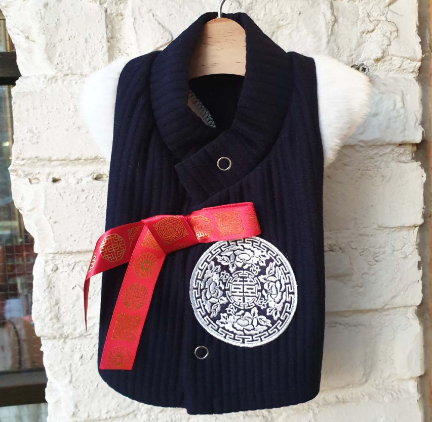 Navy blue cotton ribbed pet hanbok vest with a red ribbon and silver circular embroidery.