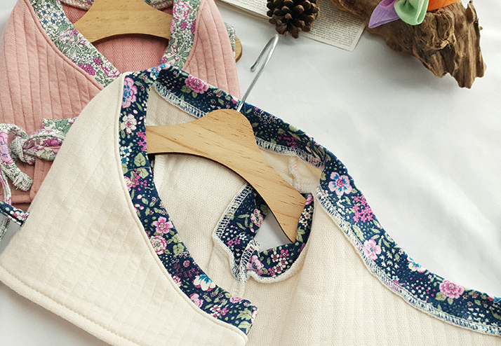 Floral ribbed modern pet hanbok in cream and navy blue with traditional jeogori style design.