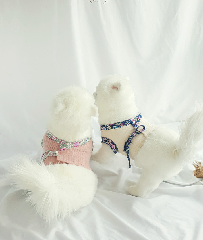 Floral ribbed modern pet hanbok in pink and cream with floral pattern trim.