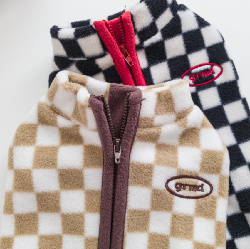 NKpup checked fleece dog vests in tan and white and black and white patterns with zipper closures
