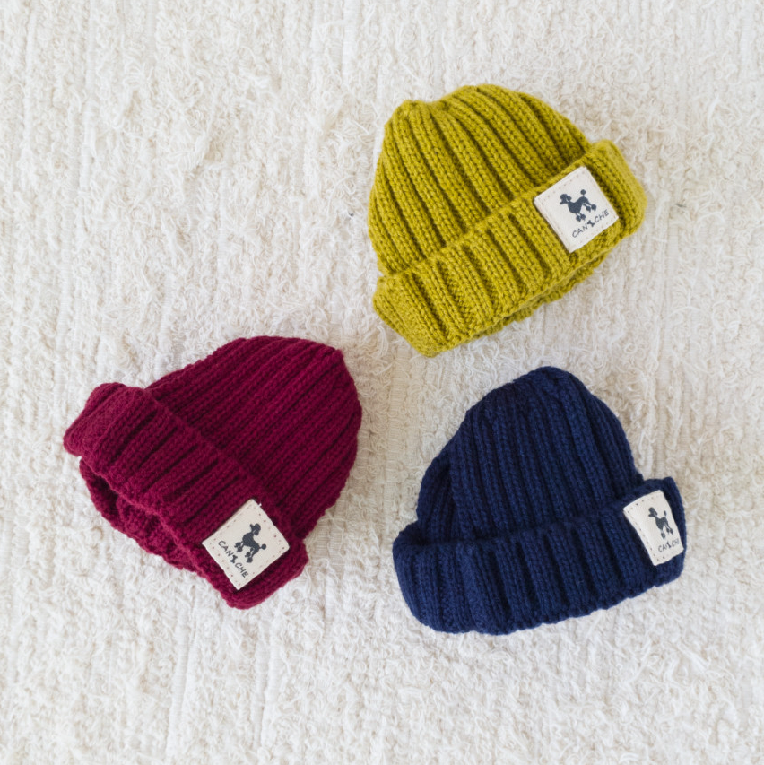 Three NKpup Ribbed Cuff Dog Beanies in mustard yellow, burgundy, and navy blue.