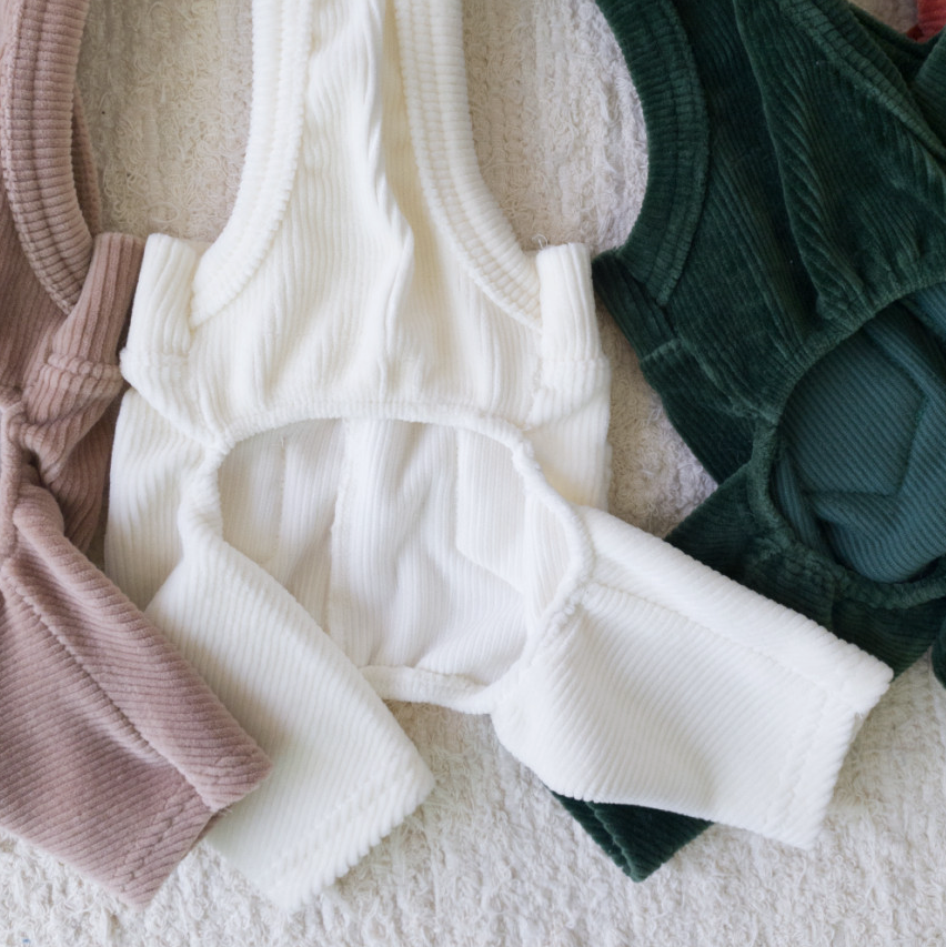 NKpup corduroy dog suspender overalls in beige, white, and dark green