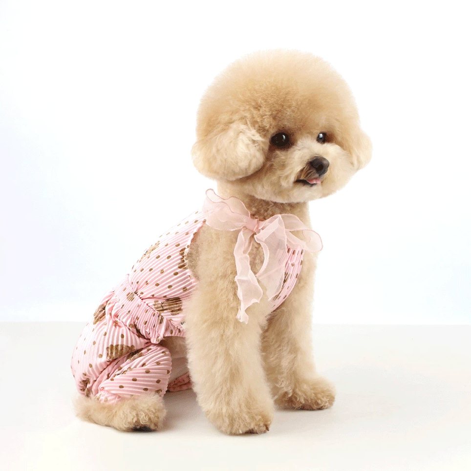 Bali Ribbon Dog Overall in pink with polka dot patterns and a large sheer ribbon bow.