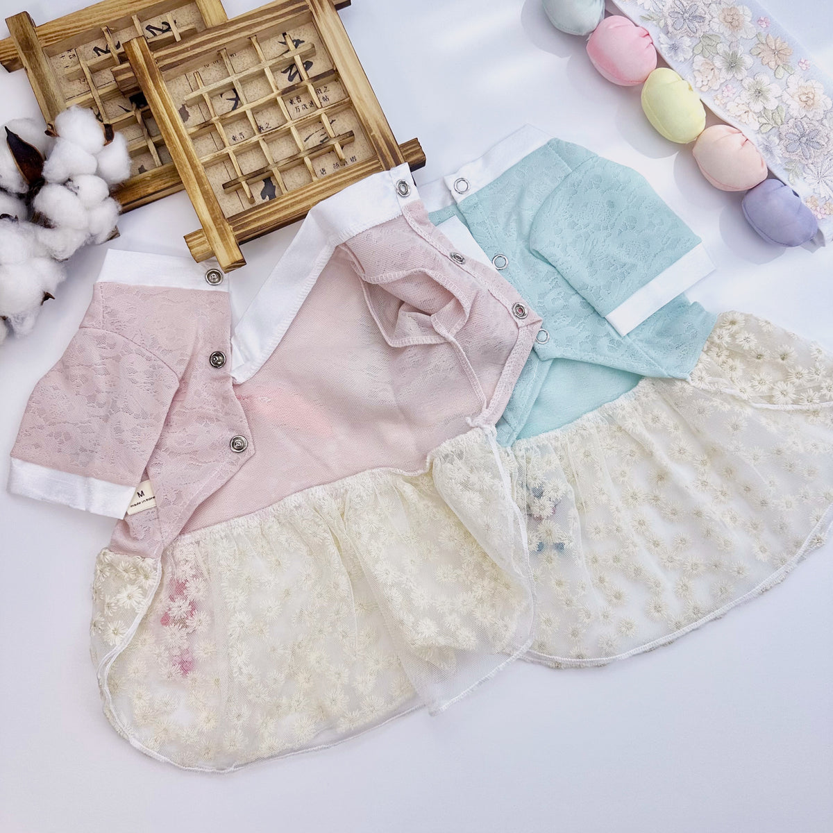 Lace floral pet hanbok in pink and light blue with delicate sheer skirts