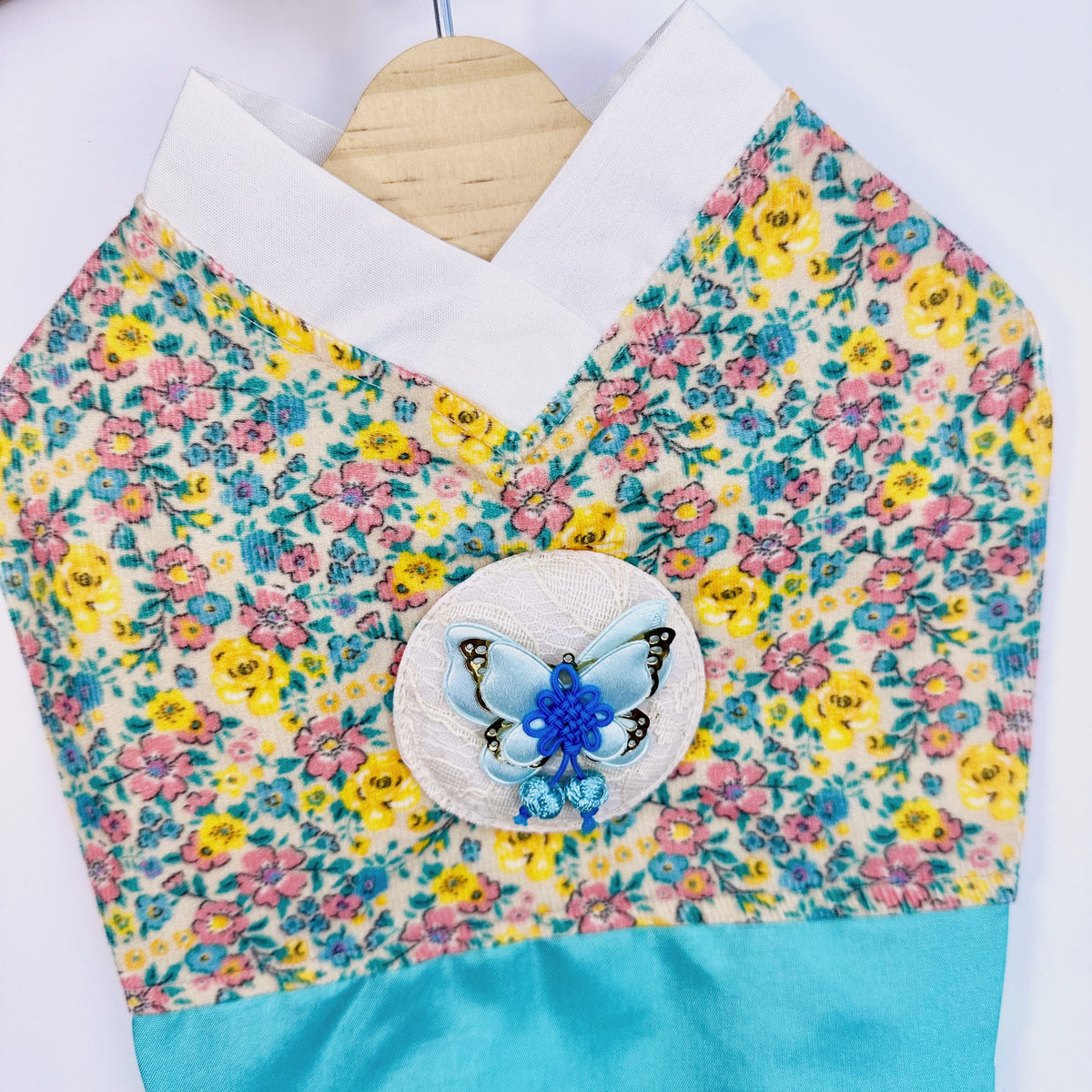 NKpup retro floral pet hanbok with a blue butterfly norigae ornament and turquoise trim
