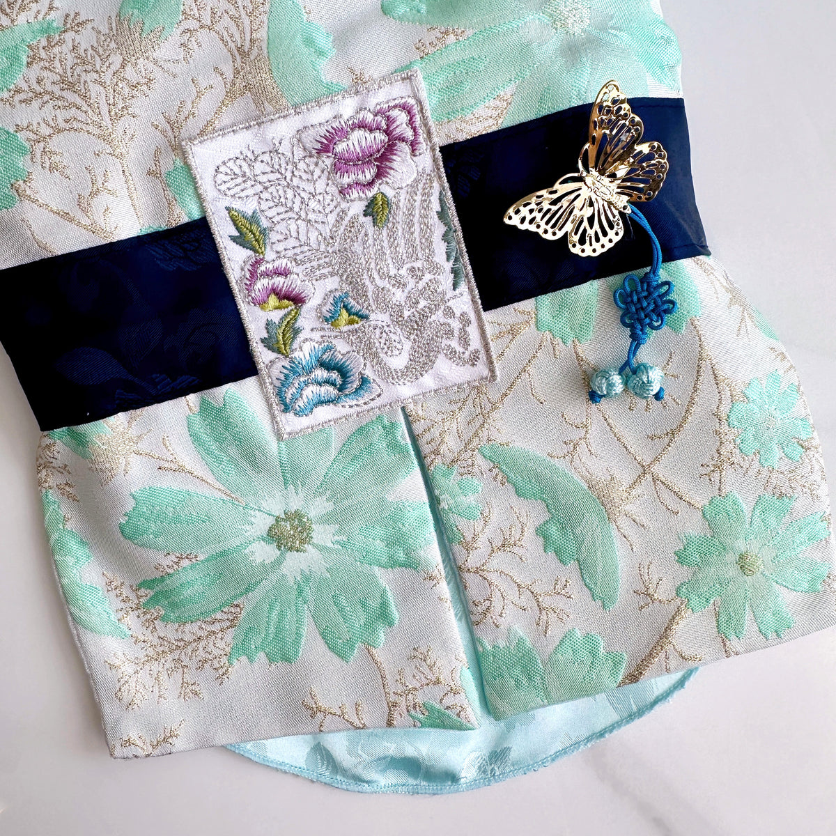 Flower Vest Pet Hanbok with floral embroidery and gold butterfly ornament by NKpup
