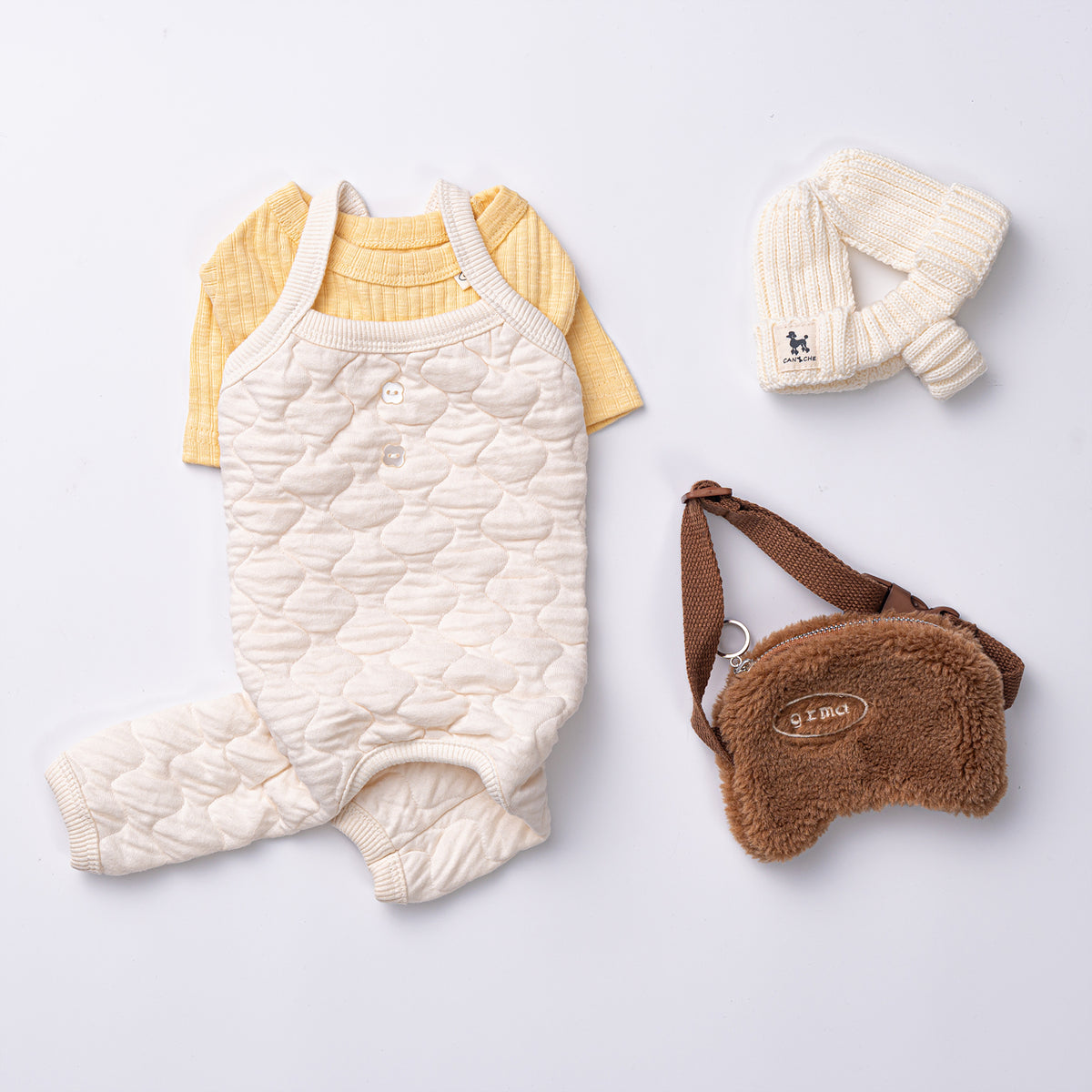 Natural quilted cream dog romper and yellow shirt with matching cream mittens and brown fuzzy pet bag