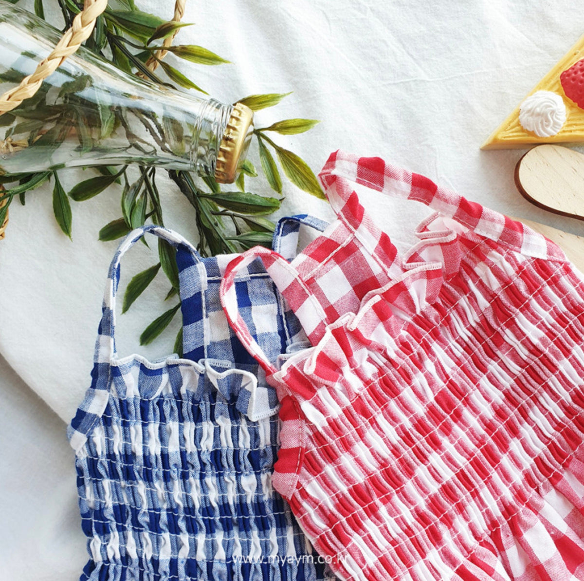 NKpup Gingham Smocked Dog Dresses in red and blue checkered patterns