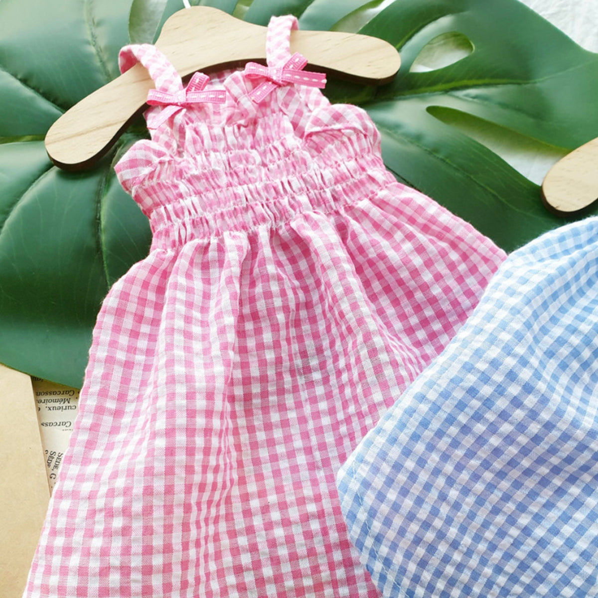 Pink and blue gingham vintage dog dress with bow shoulder straps