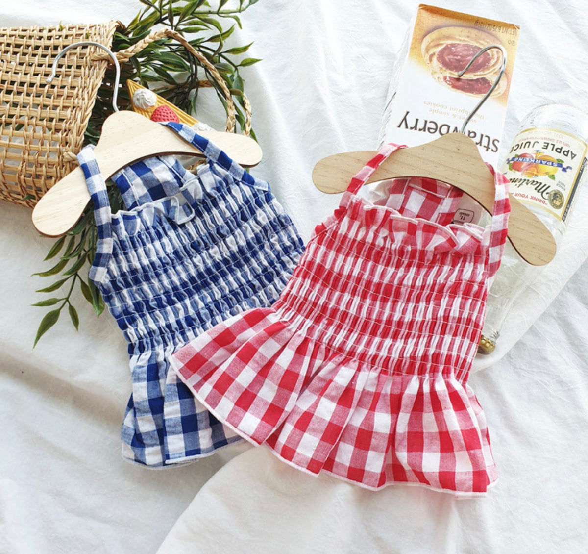 NKpup gingham smocked dog dresses in blue and red checked patterns