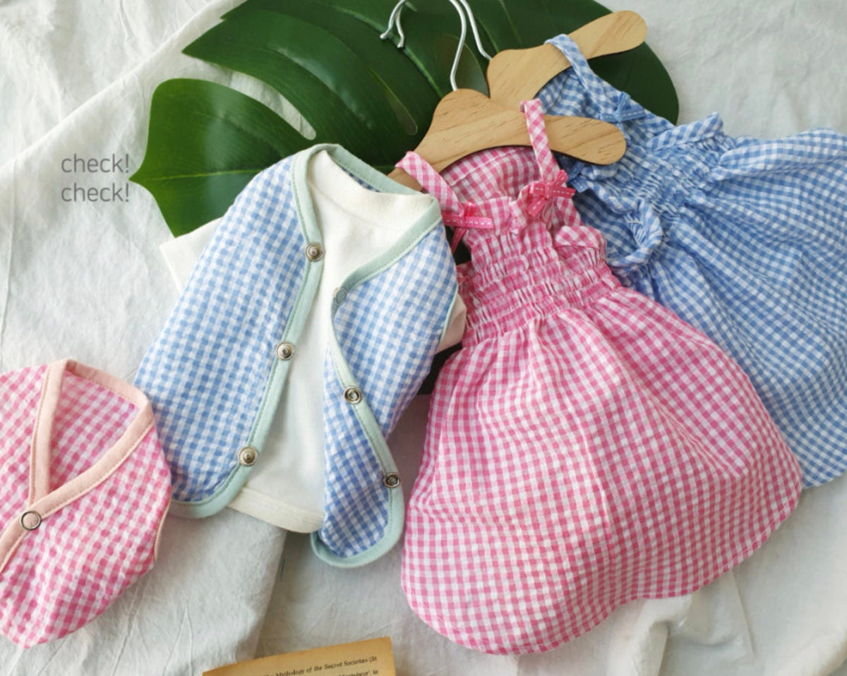 Vintage gingham pattern dog dress in pink and blue with a matching vest and hat.