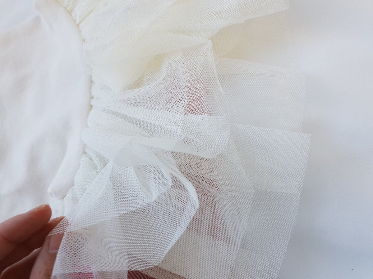 White layered tulle tutu detail on an NKpup dog dress