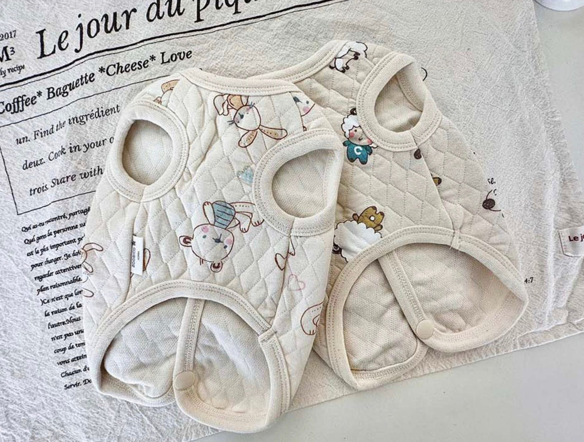 Cream cotton quilted dog vest with cute character illustrations
