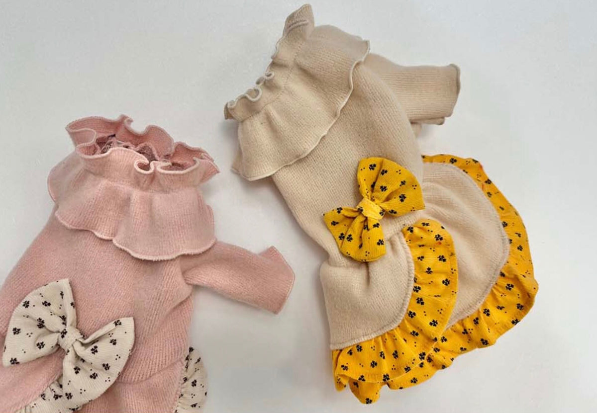 NKpup Frilled Ribbon Dog Dresses in pink and beige with floral bow accents.