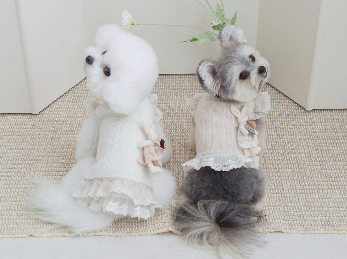NKpup Linen Frilled Crop Top in ivory with ruffle trim and a decorative floral accent