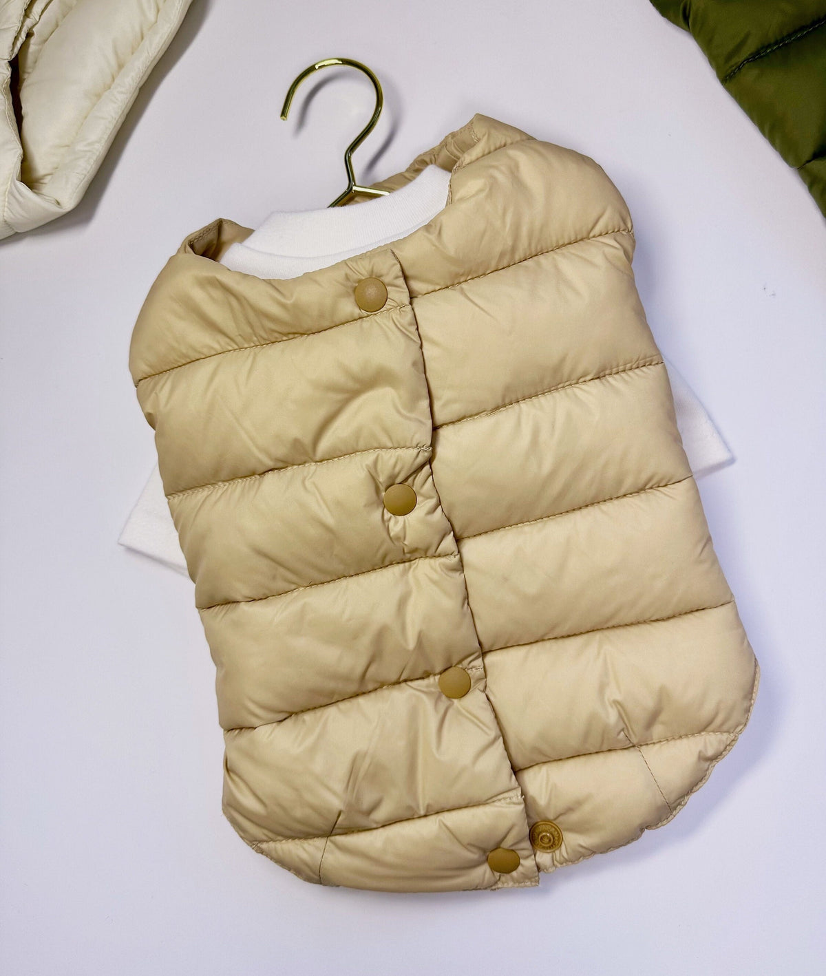Beige quilted duck down dog vest by NKpup with button closures