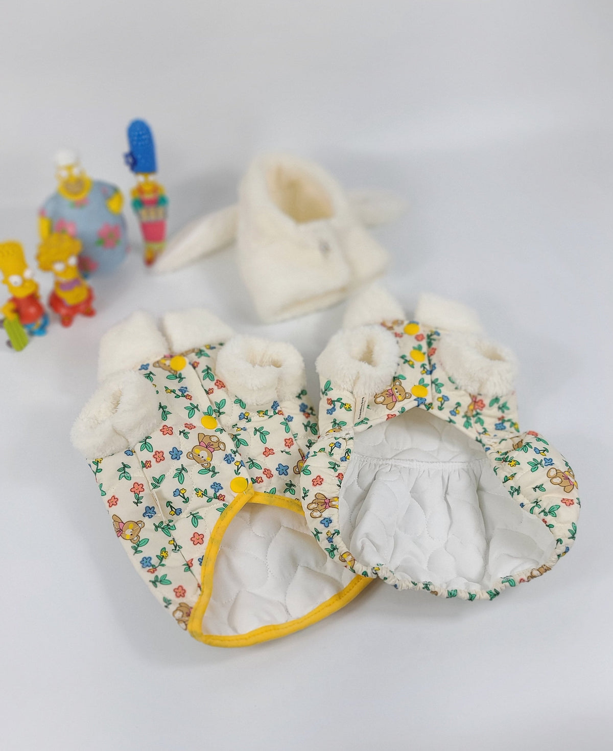 NKpup floral padded dog vest with white faux fur trim and yellow button accents