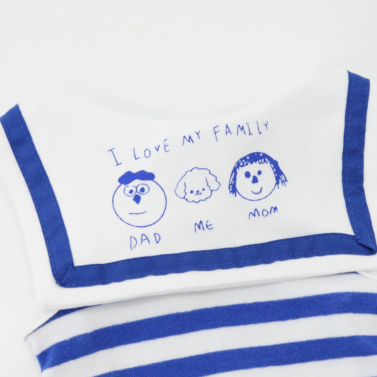 NKpup white stripe collar T-shirt with blue family illustration and text