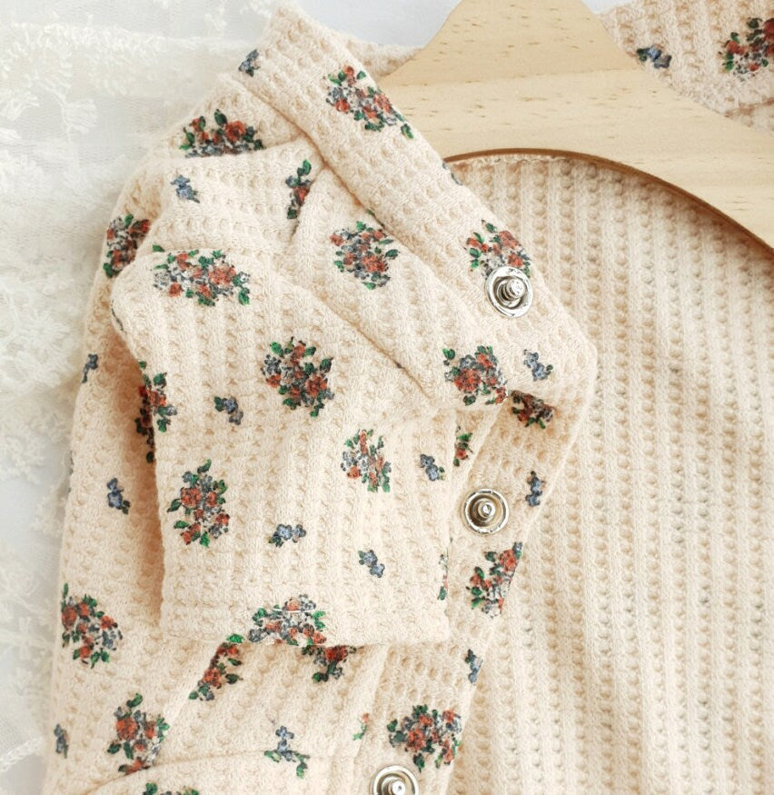NKpup Floral Dog Cardigan in cream with a delicate floral pattern and silver button details