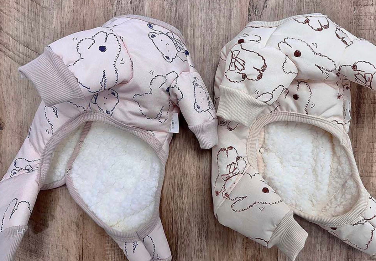 Two Ribbon Bear Padded Dog Overalls in light pink and cream with bear pattern.
