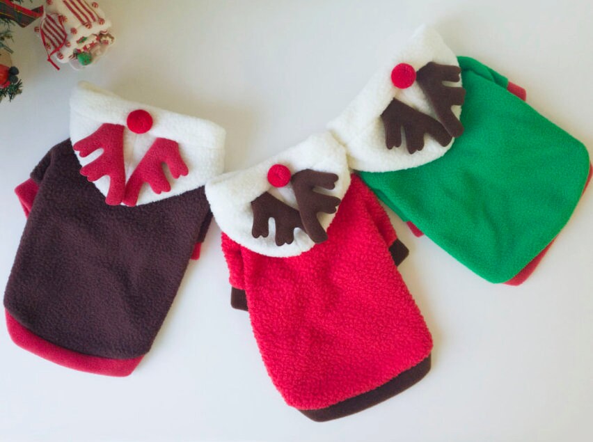 NKpup Reindeer Fleece Dog Hoodies in brown, red, and green with reindeer antler hoods