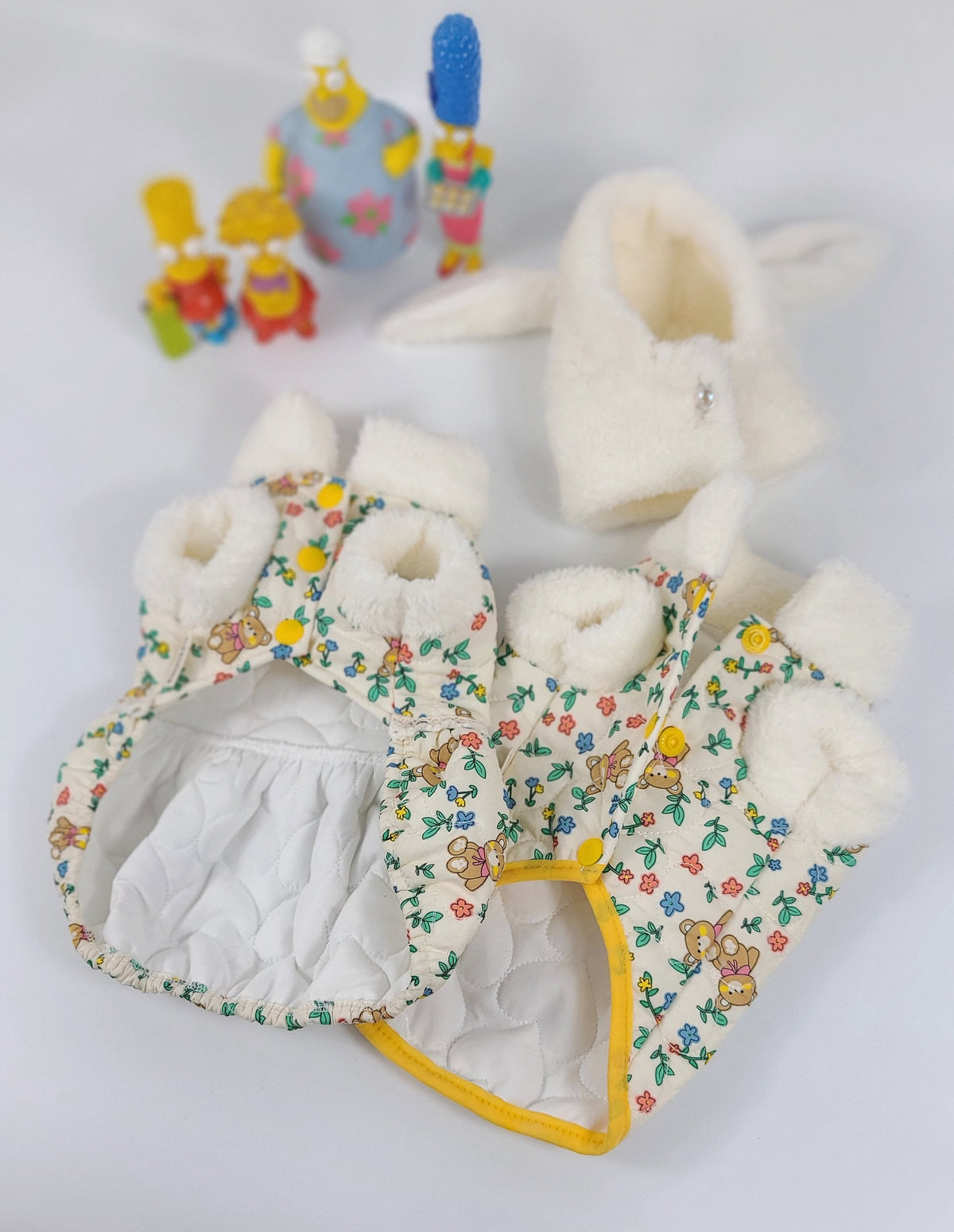 Floral padded dog vest and dress with white faux fur trim and cute bear pattern.