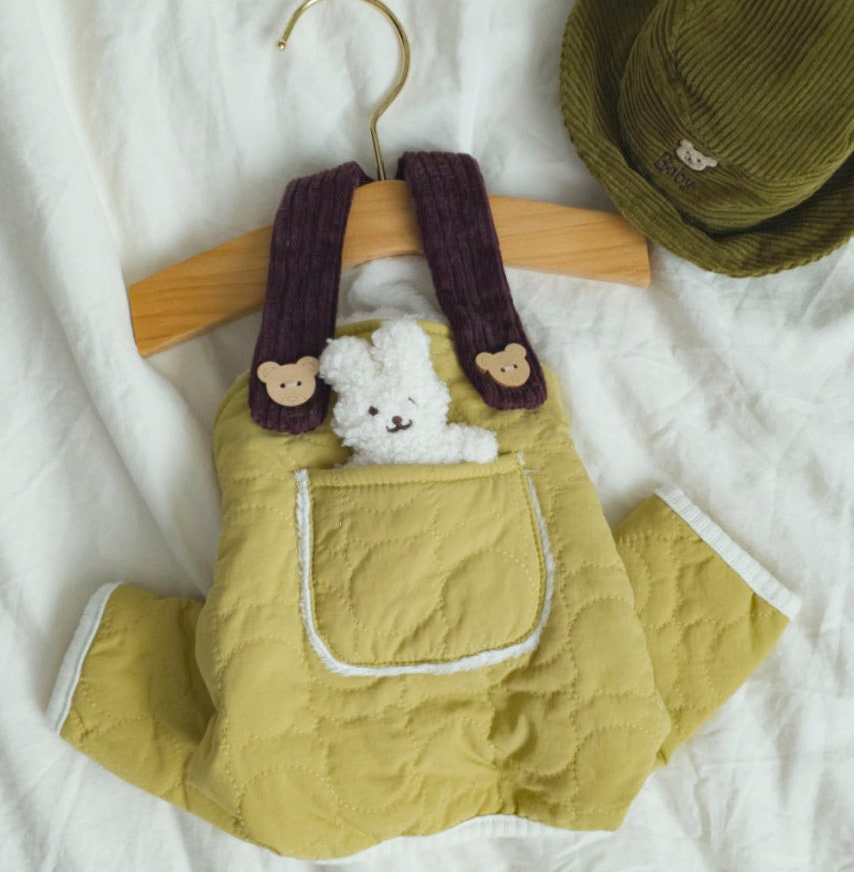 NKpup yellow quilted pocket padded dog overall with purple straps and plush bear and bunny accents