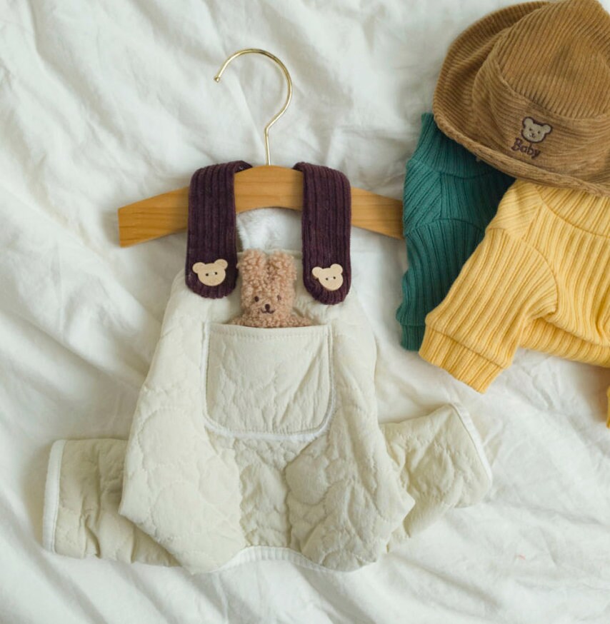 NKpup cream pocket padded dog overall with purple bear-themed straps