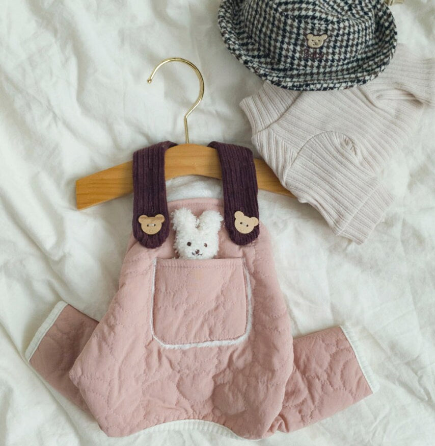 NKpup pink padded dog overall with brown straps, a front pocket, and small bear decorations