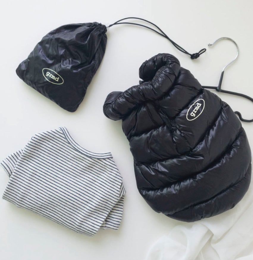 Black puffer dog vest and striped pet shirt by NKpup