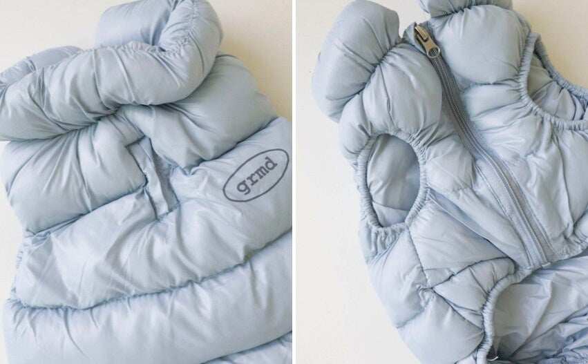 Light blue pastel puffer padded dog vest with a front zipper closure by NKpup.