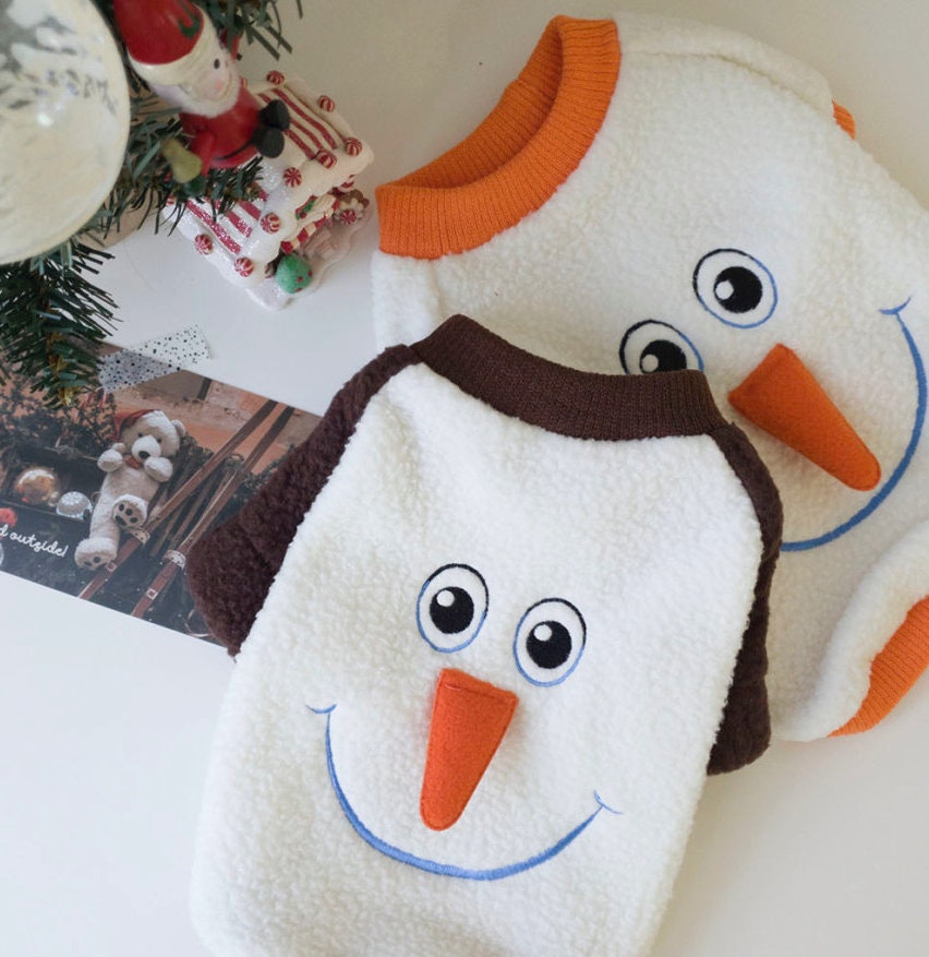 NKpup Christmas Snowman Dog Sweatshirts in white with snowman face embroidery and brown and orange trim