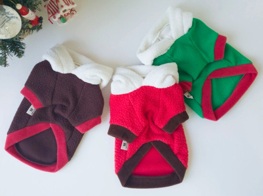 NKpup Reindeer Fleece Dog Hoodies in brown, red, and green with white fleece lining.