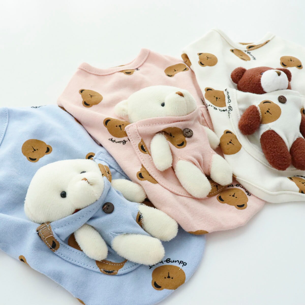 NKpup Bear Pocket Dog Shirt in blue, pink, and white with plush teddy bear details.