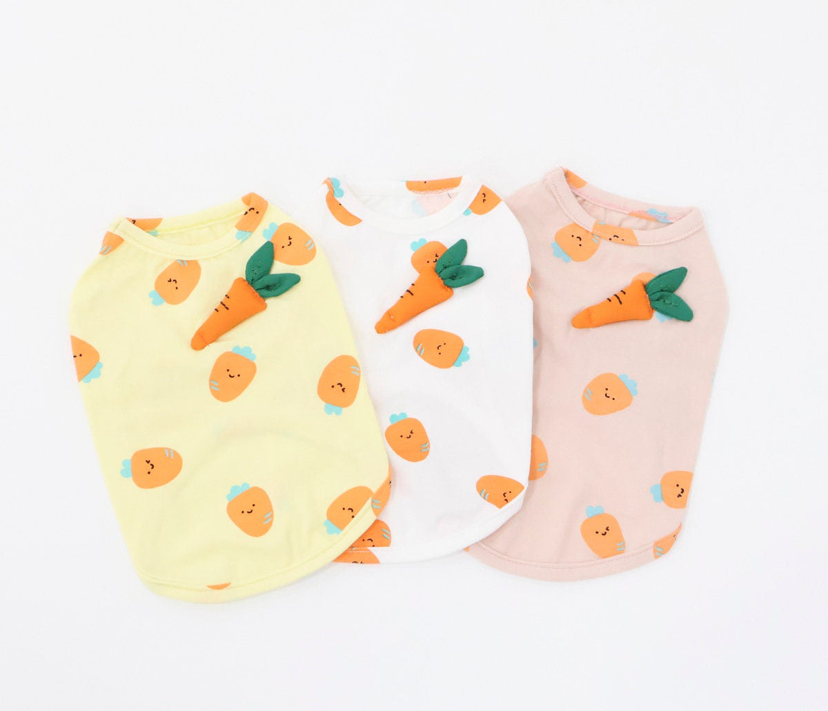 NKpup Carrot Dog Shirts in yellow, white, and pink with cute carrot patterns and 3D carrot accents