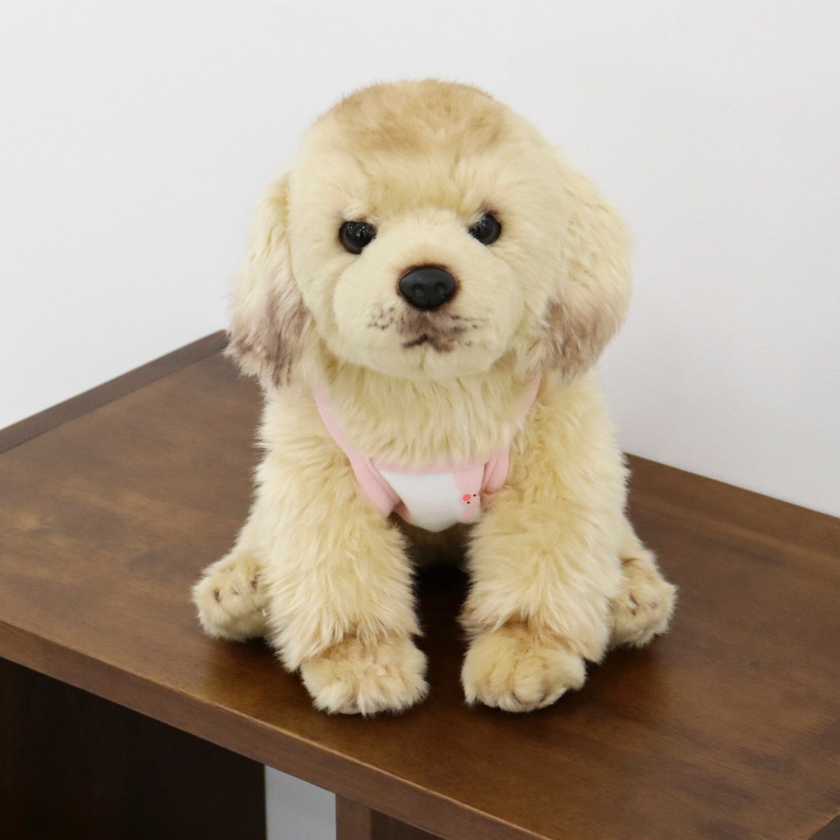 Pink Rabbit Carrot dog tank top worn by a plush dog toy