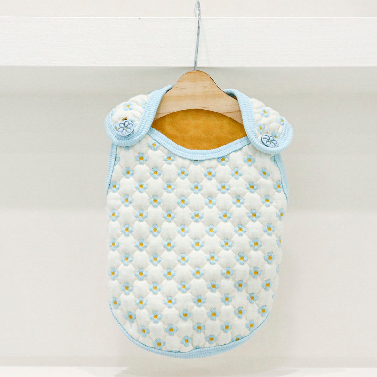 NKpup Daisy Quilted Dog Vest in white with light blue floral patterns