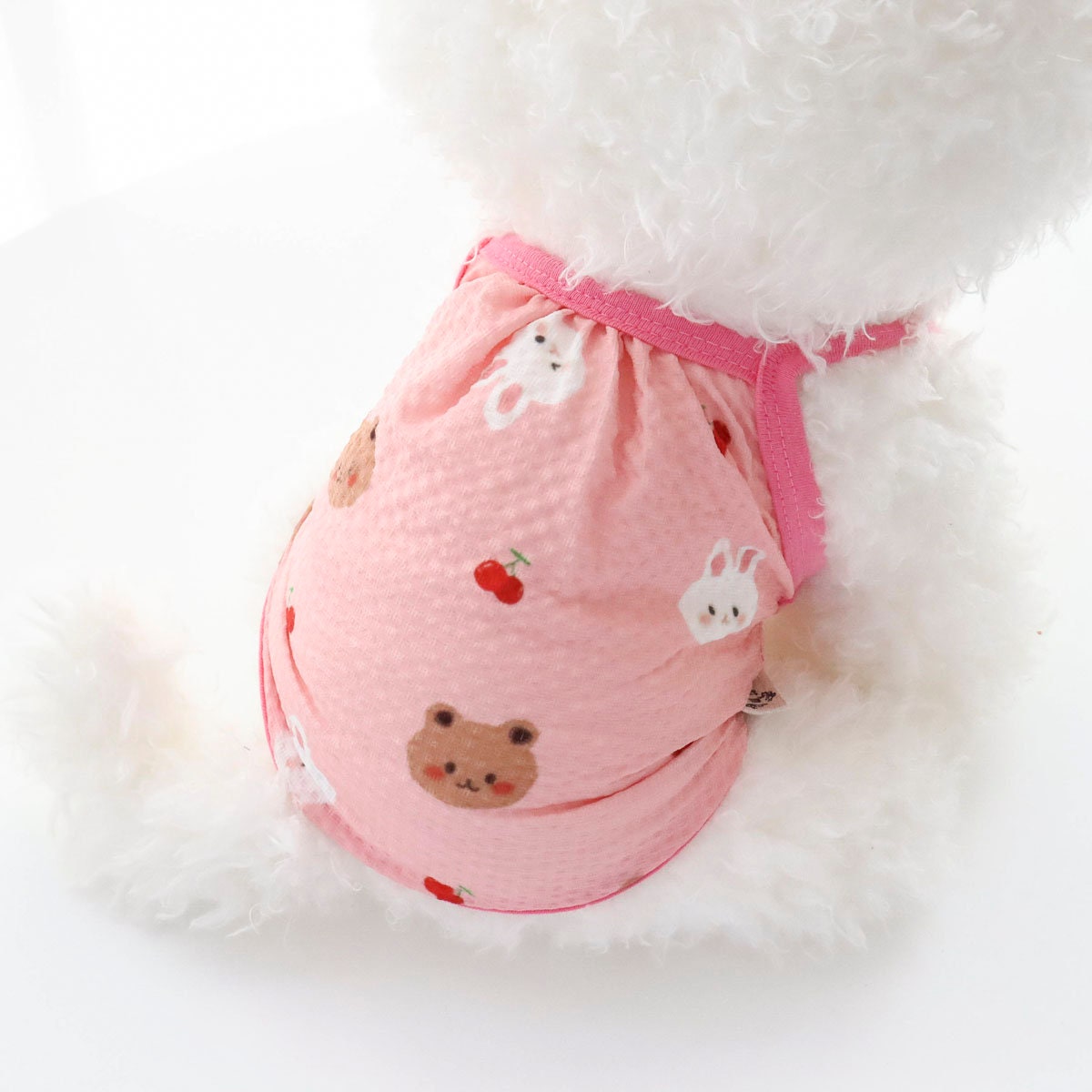 NKpup Yoryu Play Top pink dog romper with bear and rabbit patterns