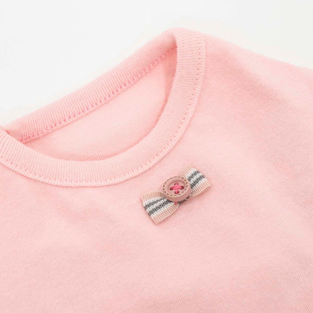 Pink Puff Sleeve T-shirt for dogs with a small striped bow detail.