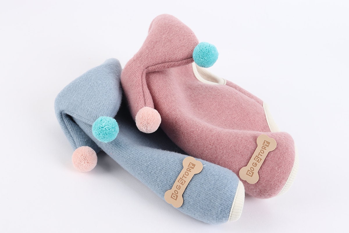 NKpup Pierrot Dog Hoodie Vests in light blue and dusty pink with decorative pom poms