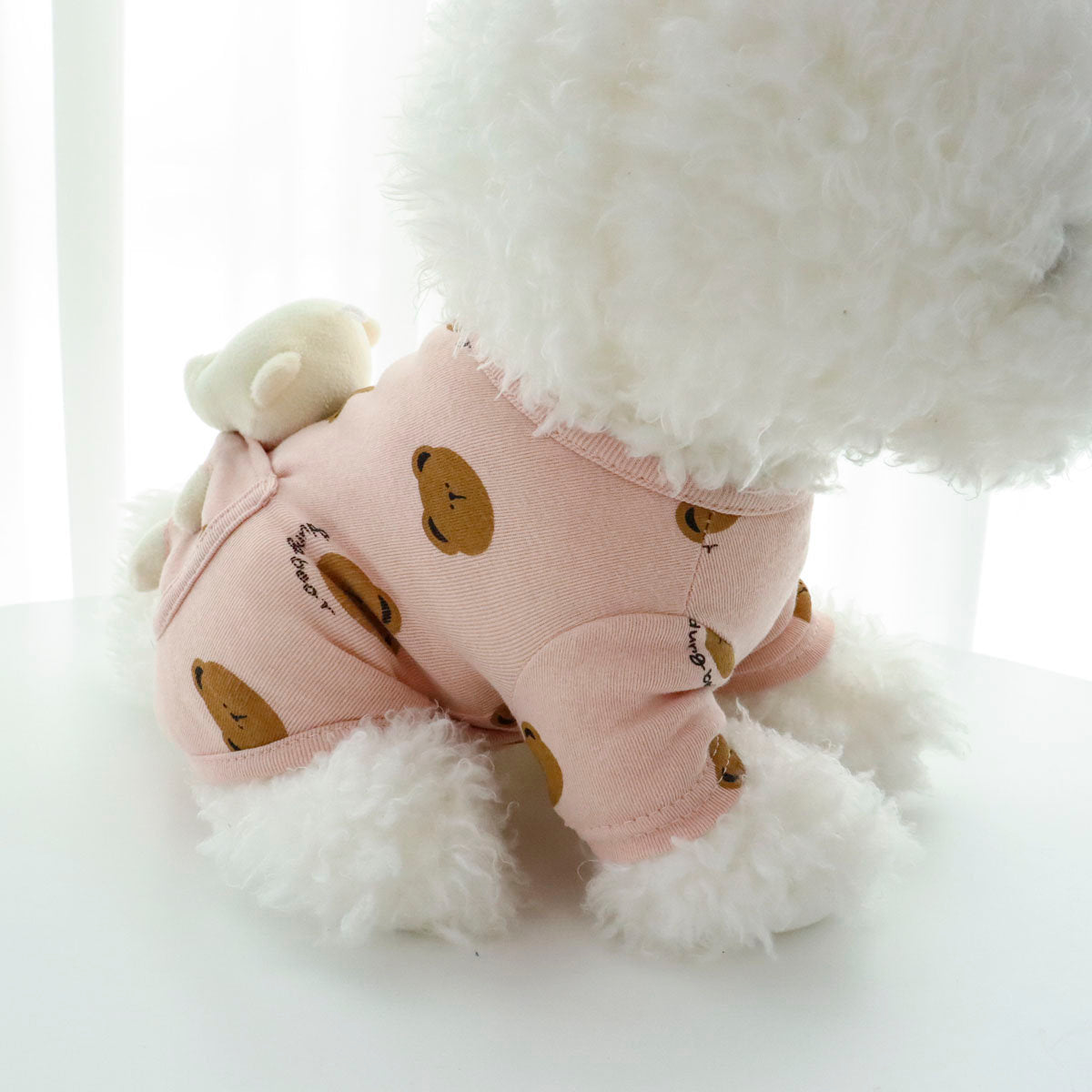 Pink NKpup Bear Pocket Dog Shirt with brown bear pattern and decorative bear plush.
