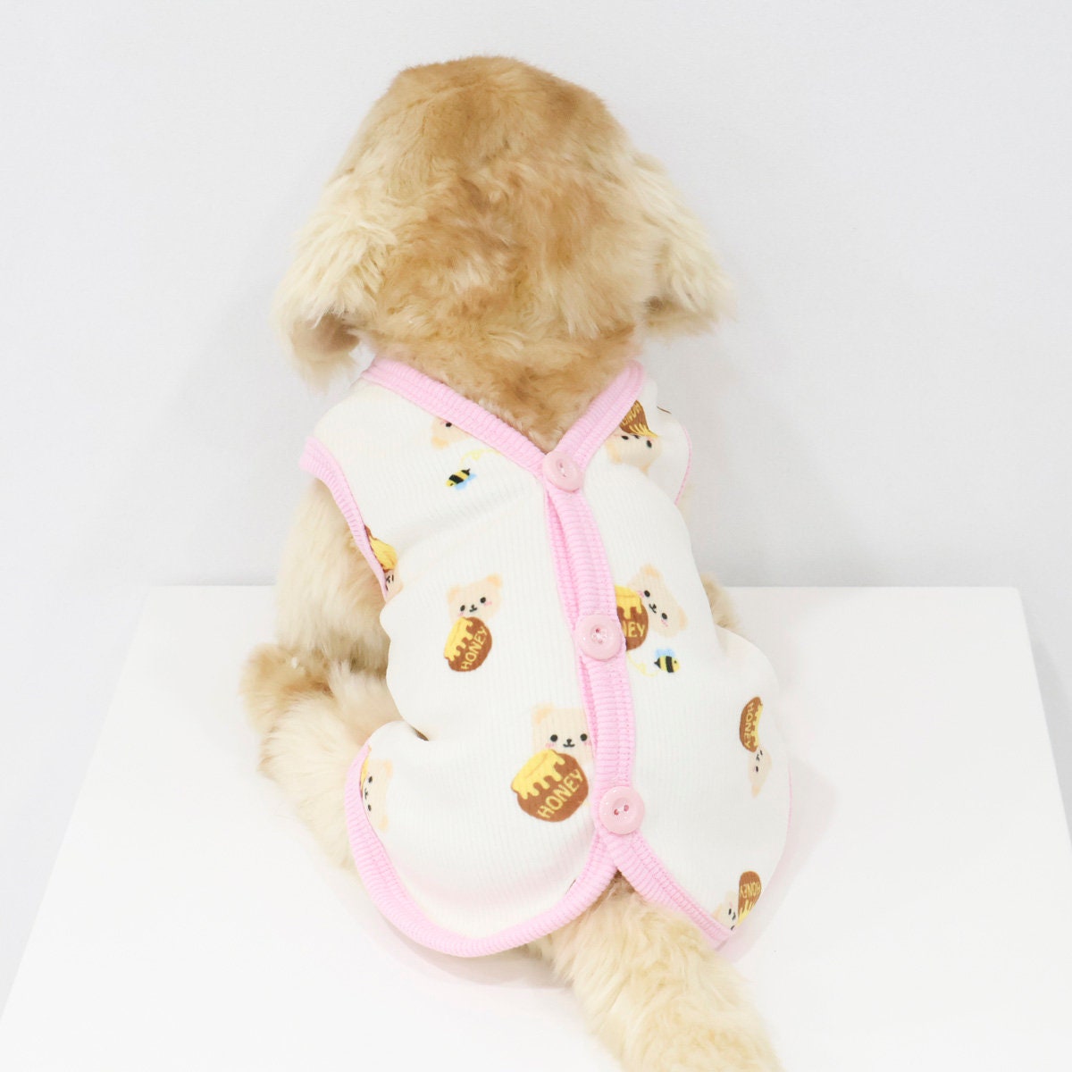 White NKpup Honey Bear ribbed dog vest with pink trim and bear pattern
