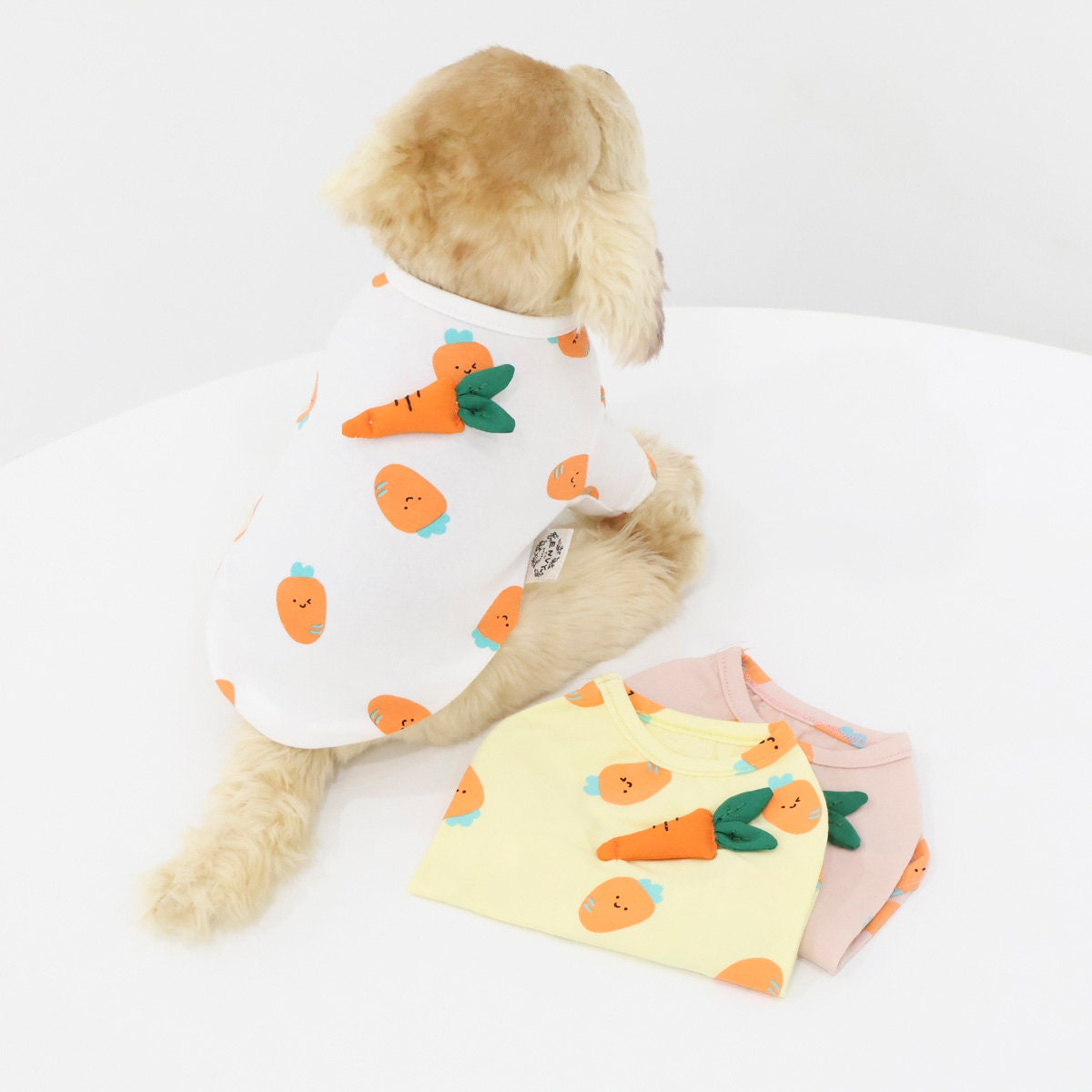 NKpup Carrot Dog Shirt in white, yellow, and pink with cute carrot patterns and 3D carrot appliqués.