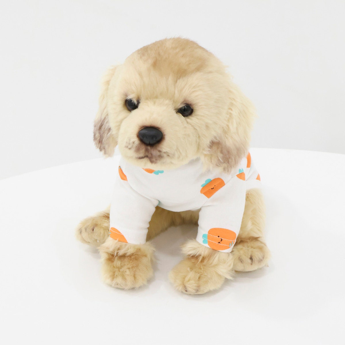 White NKpup dog shirt with orange carrot pattern