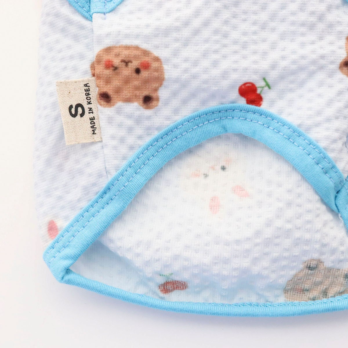Light blue Yoryu Play Top dog shirt with brown bear and cherry patterns