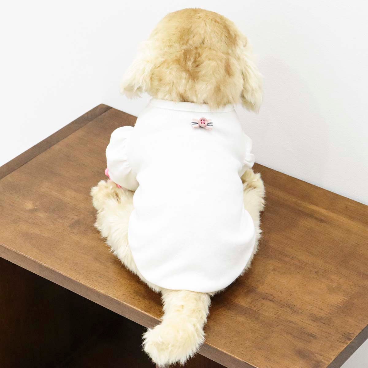 White NKpup puff sleeve dog t-shirt with small pink floral embroidery on the back