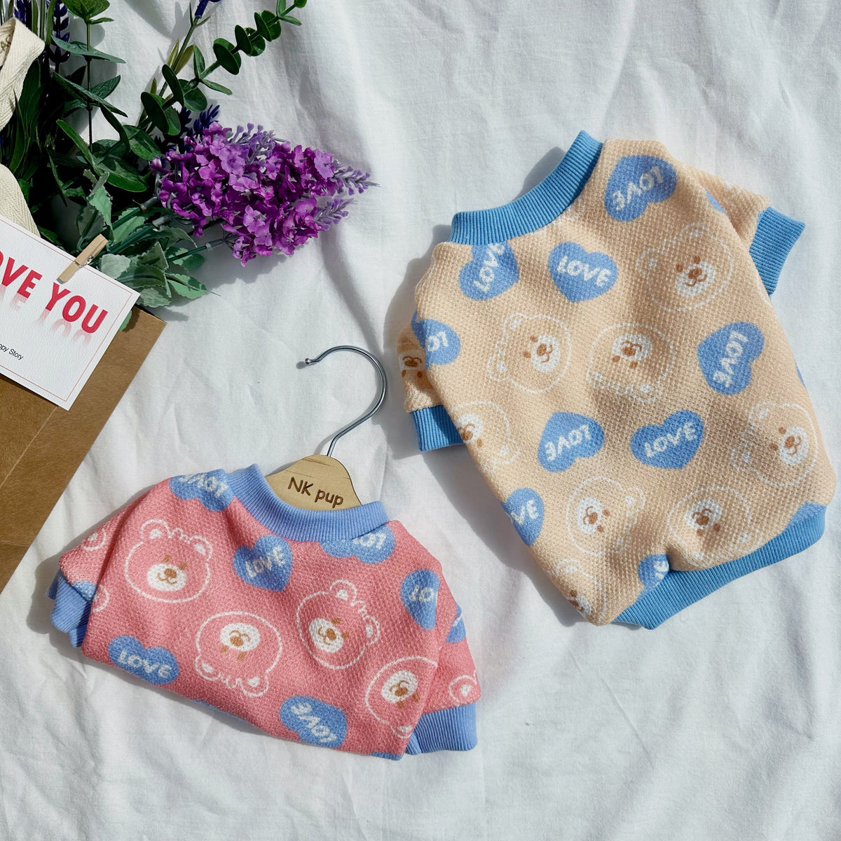 NKpup Love Bear dog shirts in pink and beige with blue heart and bear patterns.