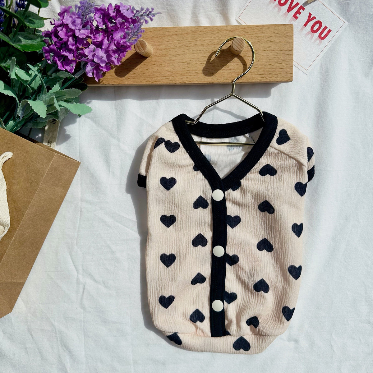NKpup cream-colored heart top dog shirt with black heart pattern and button-down front