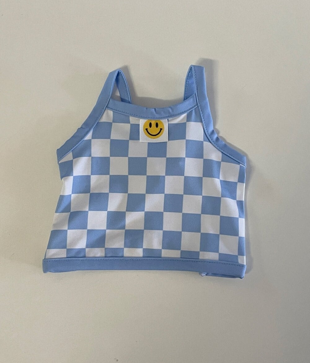 Blue and white checkered cooling crop top dog shirt with a yellow smiley face patch.