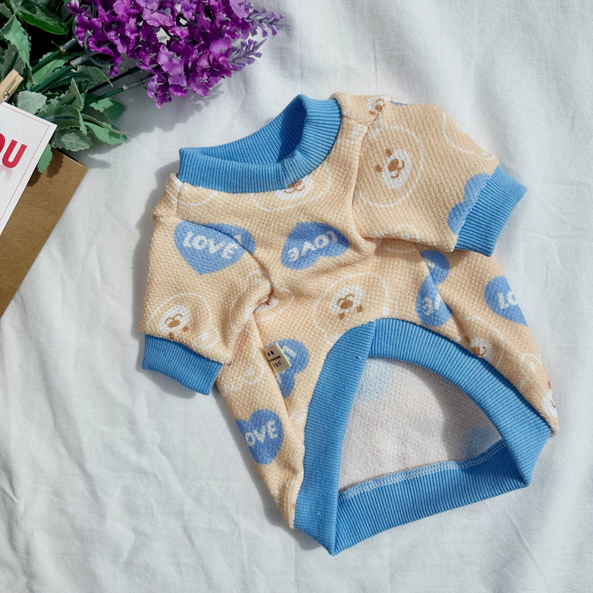 Love Bear dog shirt in peach with blue heart and teddy bear patterns